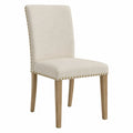 Silla de comedor beige de poliéster con estructura de madera de roble
