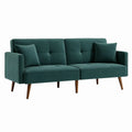 Sofá cama de tela verde con patas de madera
