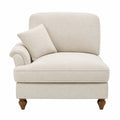 Sofá individual de tela boucle beige con patas de madera